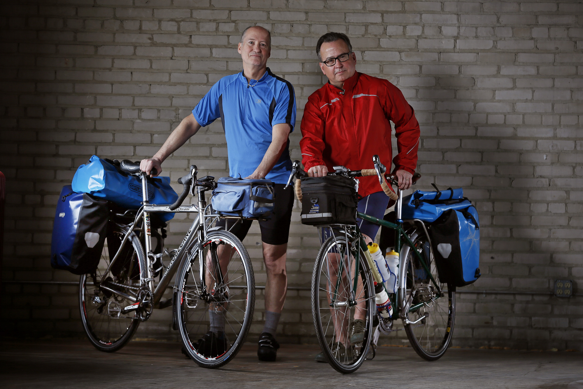 Will Fifer left and Tony Brown will ride there bicycles across America, they posed for a photo February 25, 2015 in Minneapolis.