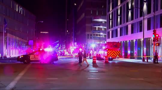 Minneapolis police say six people have been wounded in two likely gang-related shootings in downtown Minneapolis.