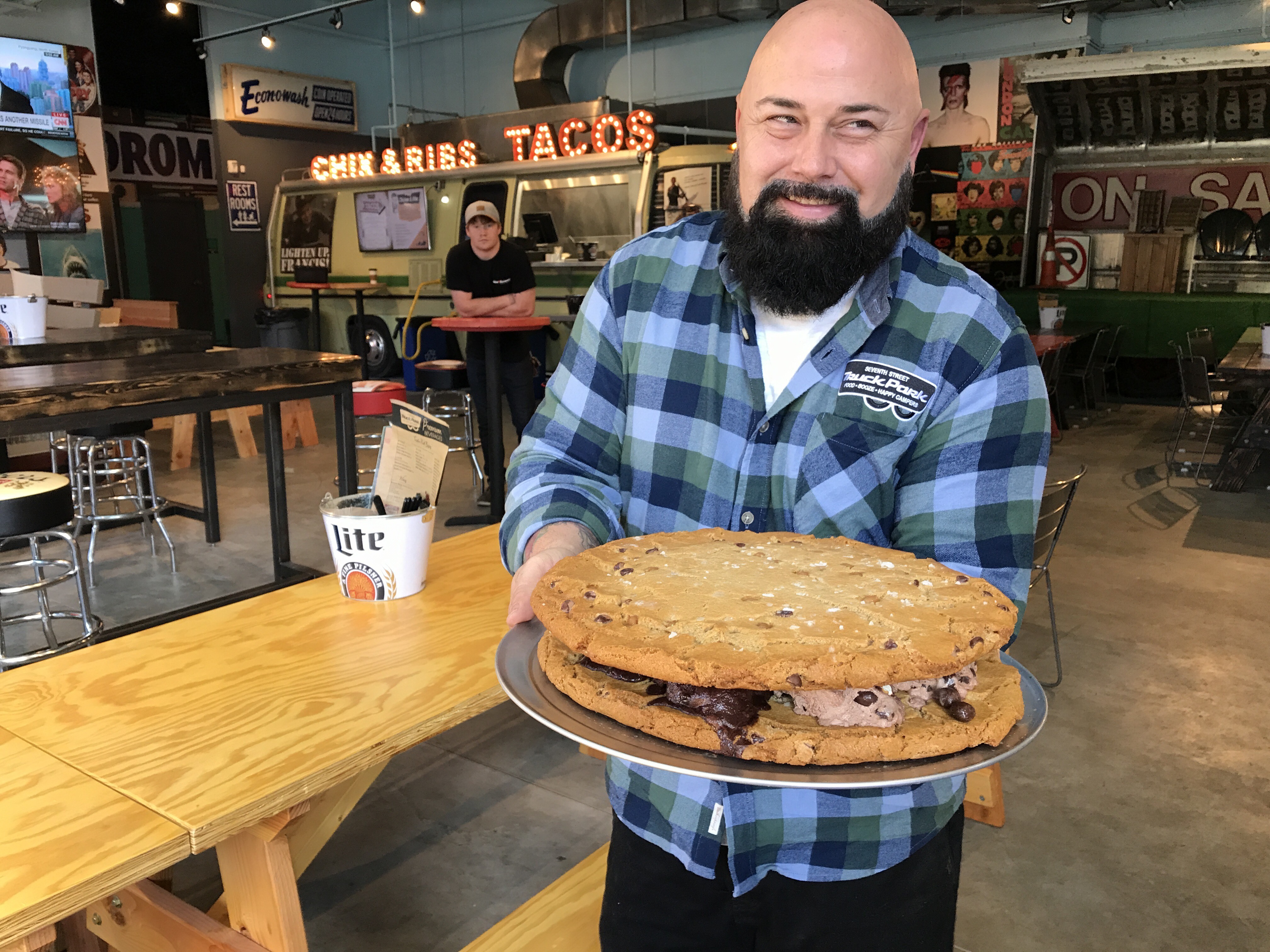 Brian Ingram, owner of Truck Park, holds one of his giant ice cream sandwiches.