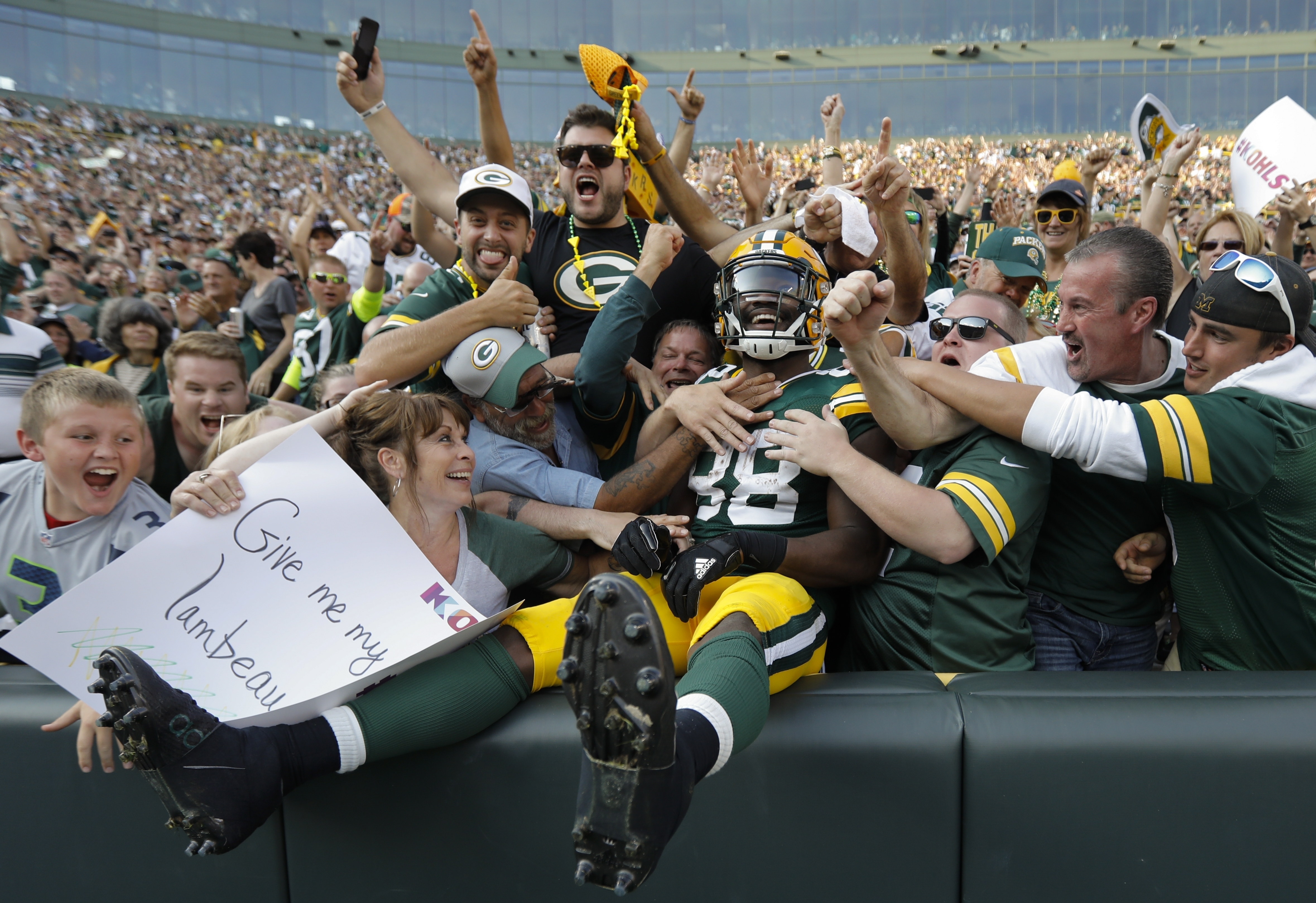 the Packers' Ty Montgomery celebrated his touchdown run with a Lambeau Leap into the crowd during the second half of a 17-9 victory over the Seahawks 