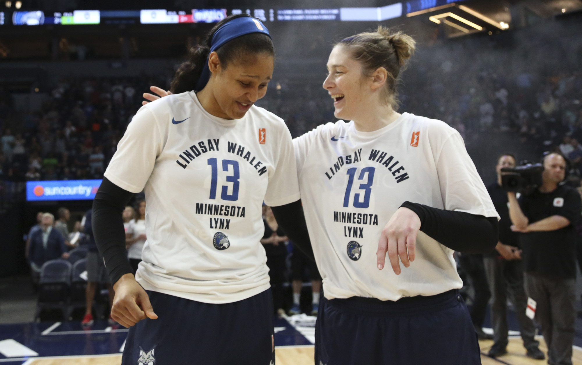 Maya Moore and Lindsay Whalen joked around with each other before the start of their last regular season game.