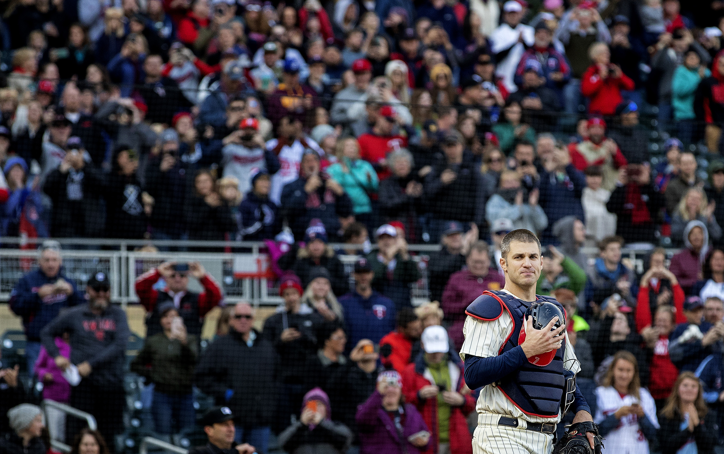 Joe Mauer stunned fans at Target Field — including his father, Jake — in the ninth inning by emerging from the Twins dugout in his catcher’s gear.