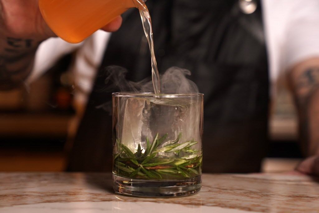 Fhima beverage director Sean Jones poured a Rosemary's Baby cocktail.