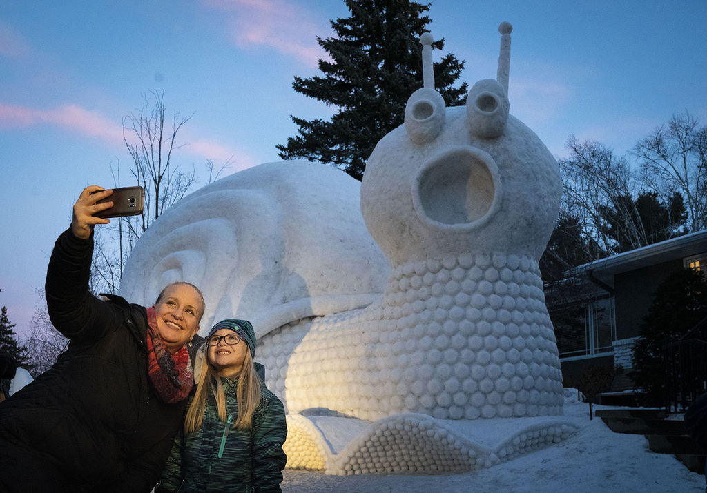 This year's Bartz brothers snow sculpture is a giant snail.