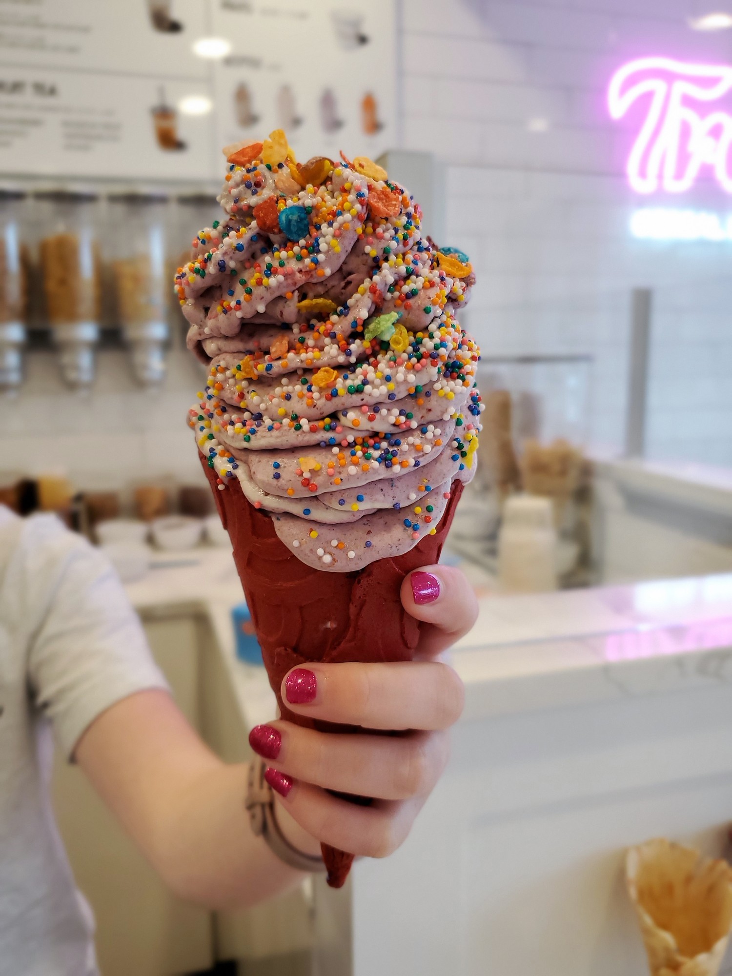 The ice cream at Treats is mixed with crushed cereal. The Berry Kiss is made with Fruity Pebbles, Froot Loops, Trix and berries.