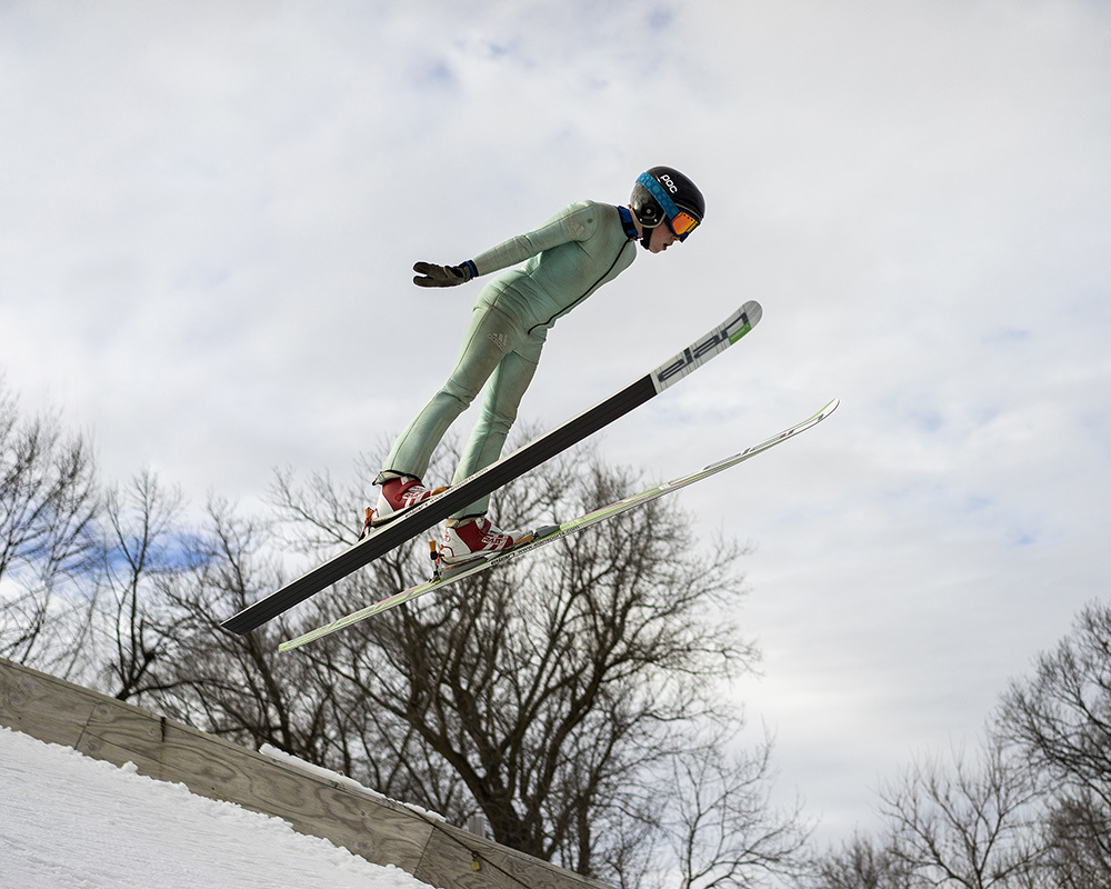A ski jumper flying at the Norge ski jump at Fox River Grove, Ill.