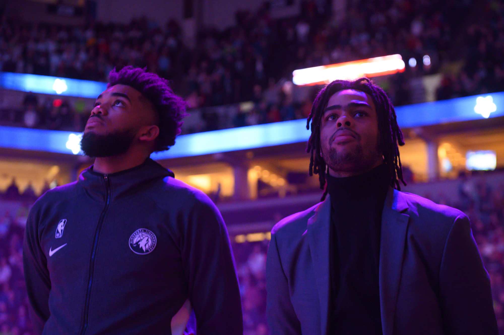 Karl-Anthony Towns and guard D’Angelo Russell didn’t get to share the court, but they stood together for the national anthem before Saturday's game.