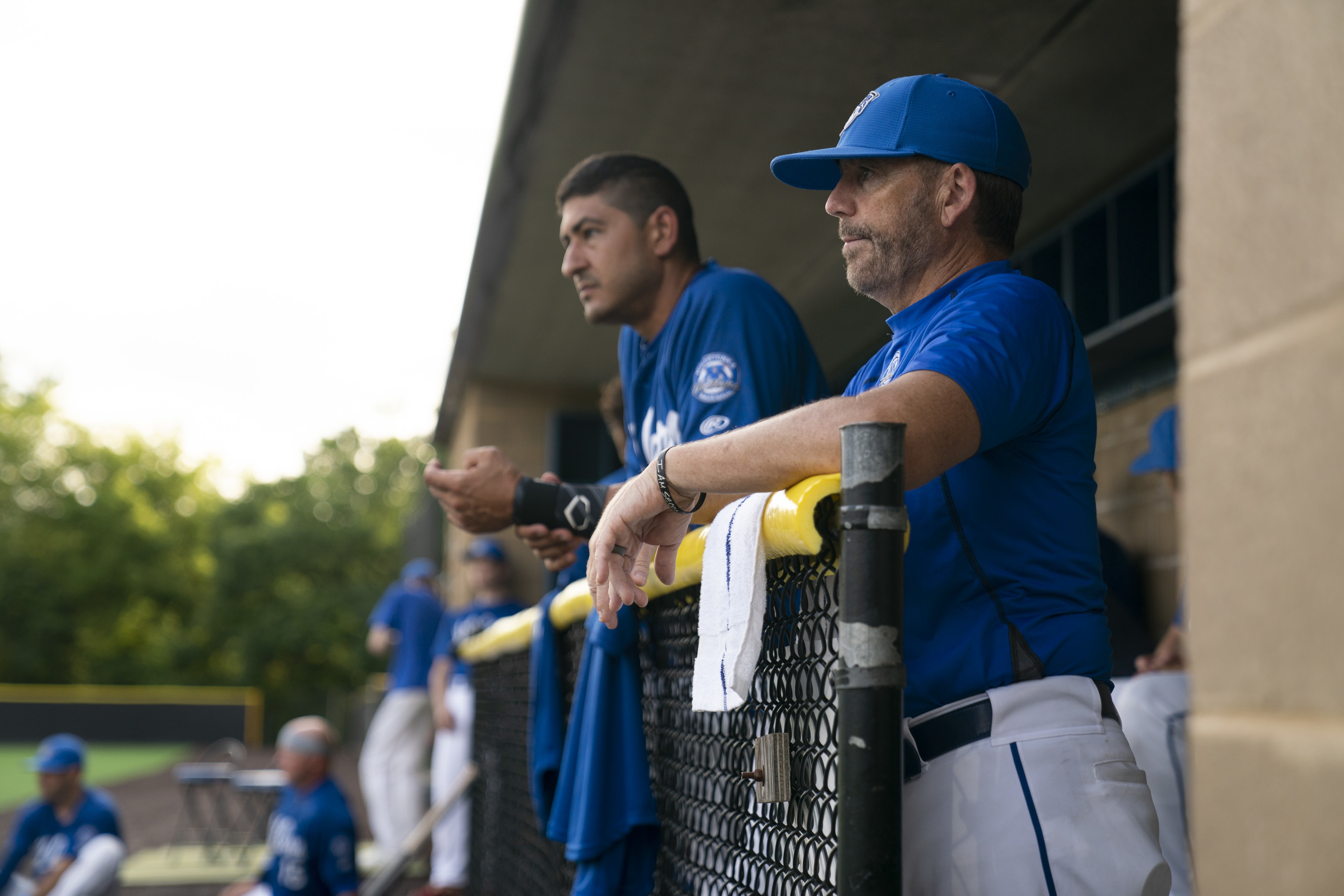 Minnetonka manager Kevin Hoy, right, eyed the pregame warmup with the Millers’ Joe Abellera.