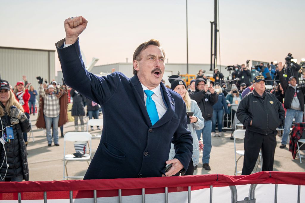 Mike Lindell, CEO of My Pillow, cheered as President Trump took the stage Oct. 30 in Rochester.