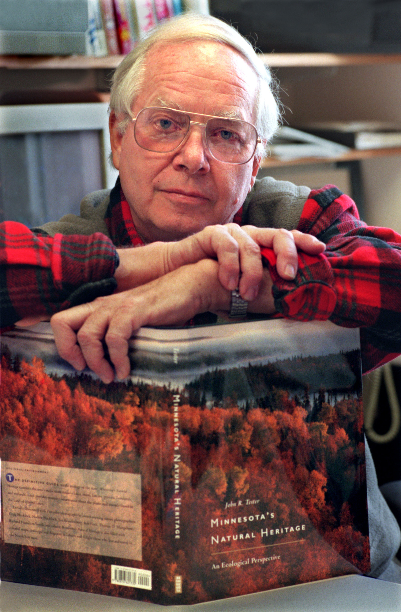 John Tester, with his book “Minnesota’s Natural Heritage” when it was published in 1995.