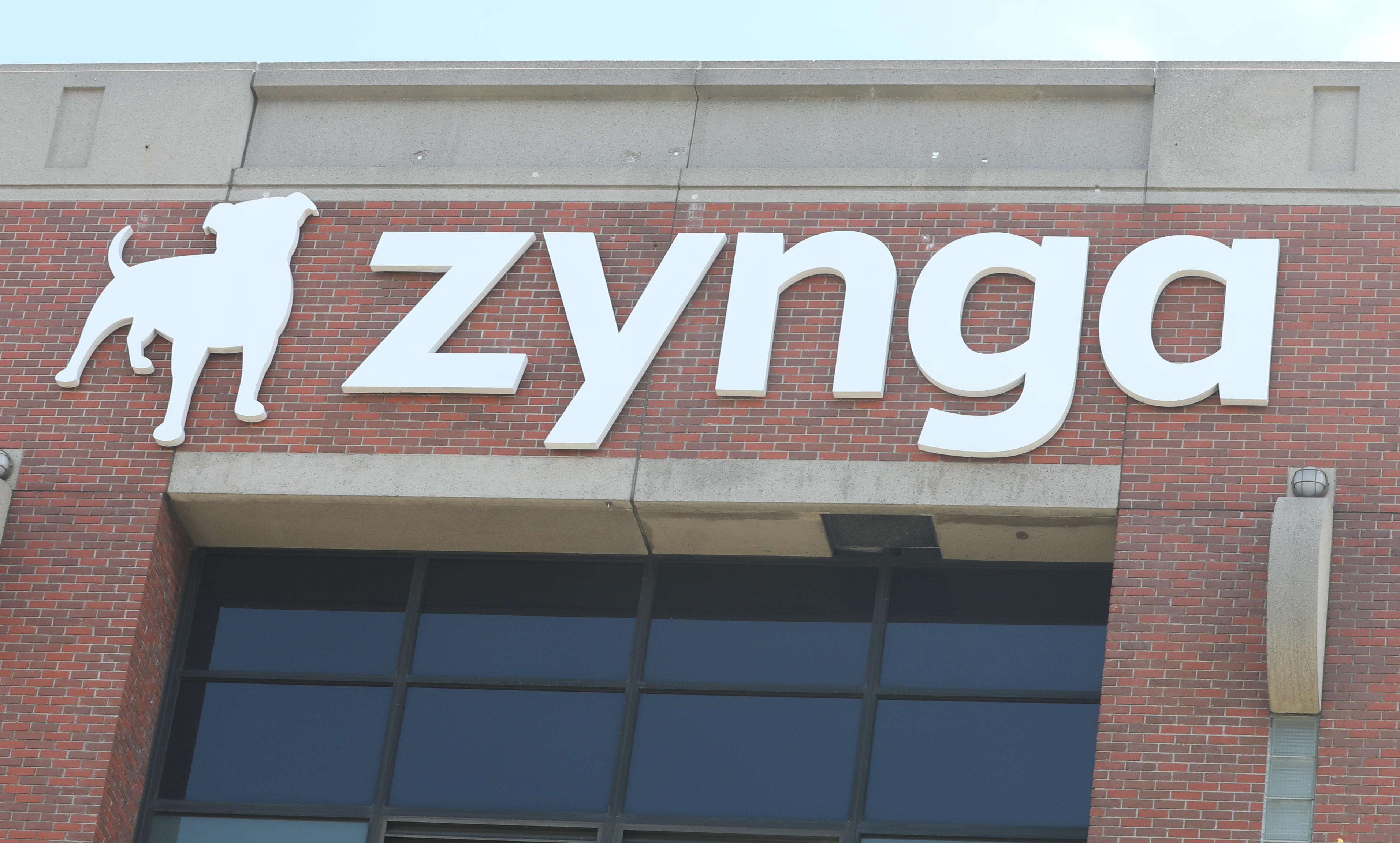 Zynga logo seen outside the top corner of the building on Tuesday, May 28, 2019 in San Francisco, Calif. Zynga is selling its headquarters building, but will lease it back and remained headquartered there