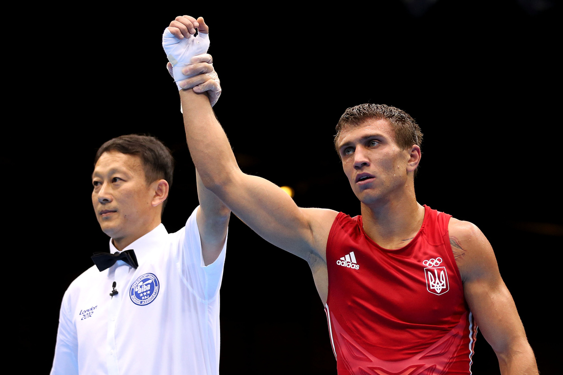 Vasyl Lomachenko cruised to a second Olympic gold medal, beating South Korea's Soonchul Han for the lightweight crown. (Photo by Scott Heavey/Getty Images)