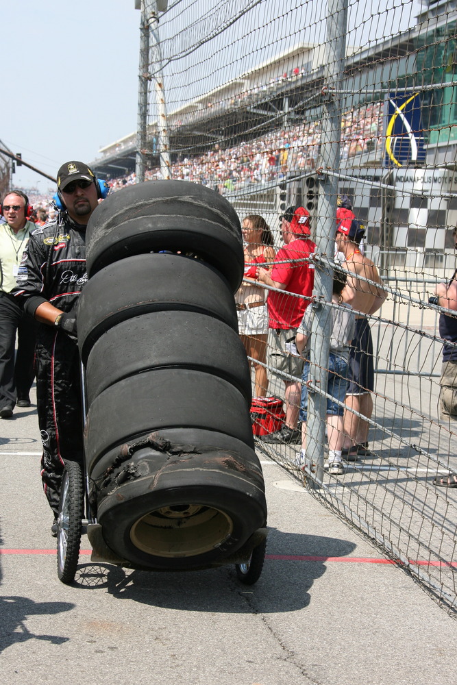 NASCAR crew members remove used Goodyear tires from the pit box during racing action at the 2008 Allstate 400 At The Brickyard. Tire issues plagued teams all day thanks to a new car and new tire compound. (Photo: Chris Jones/IMS)