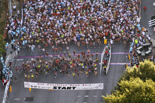 The Start of the 2010 Peachtree Road Race via Bob Andres of the Atlanta Journal-Constitution <a href="http://alt.coxnewsweb.com/cnishared/tools/shared/mediahub/09/15/00/slideshow_1001599863_peach.0705_ba05.JPG">alt.coxnewsweb.com</a>