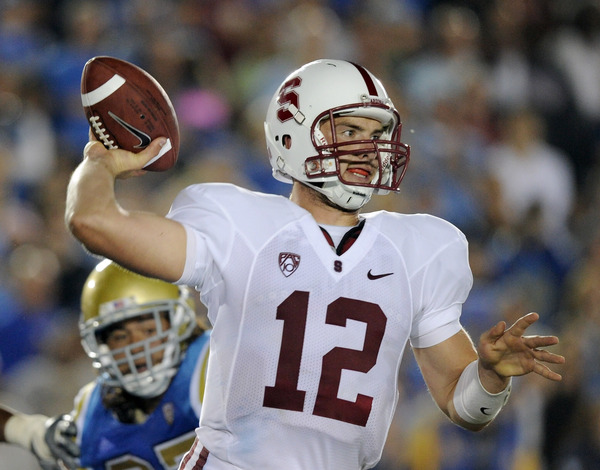 PASADENA CA - SEPTEMBER 11:  Andrew Luck #12 of Stanford passes in the pocket against UCLA during the first quarter at Rose Bowl on September 11 2010 in Pasadena California.  (Photo by Harry How/Getty Images)