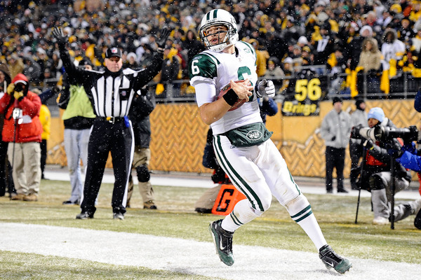 PITTSBURGH PA - DECEMBER 19:  Mark Sanchez of the New York Jets runs for a touchdown during the game against Pittsburgh Steelers at Heinz Field on December 19 2010 in Pittsburgh Pennsylvania. (Photo by Karl Walter/Getty Images)