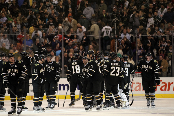 DALLAS TX - FEBRUARY 11:  The Dallas Stars celebrate the overtime win against the Chicago Blackhawks at American Airlines Center on February 11 2011 in Dallas Texas.  (Photo by Ronald Martinez/Getty Images)