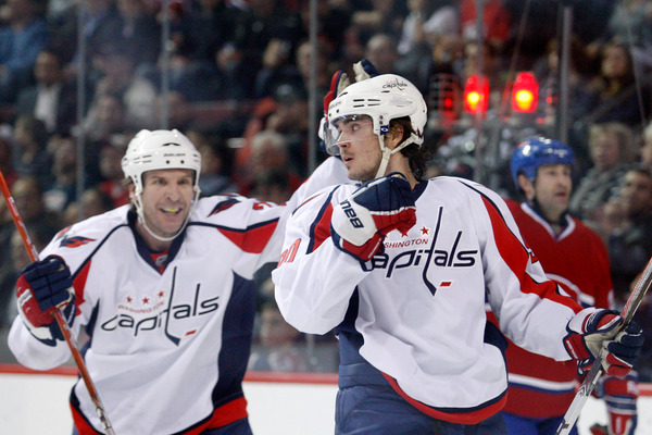 Marcus Johansson of the Washington Capitals celebrates his third period goal during the NHL game against the Montreal Canadiens at the Bell Centre on March 15, 2011 in Montreal, Quebec, Canada.