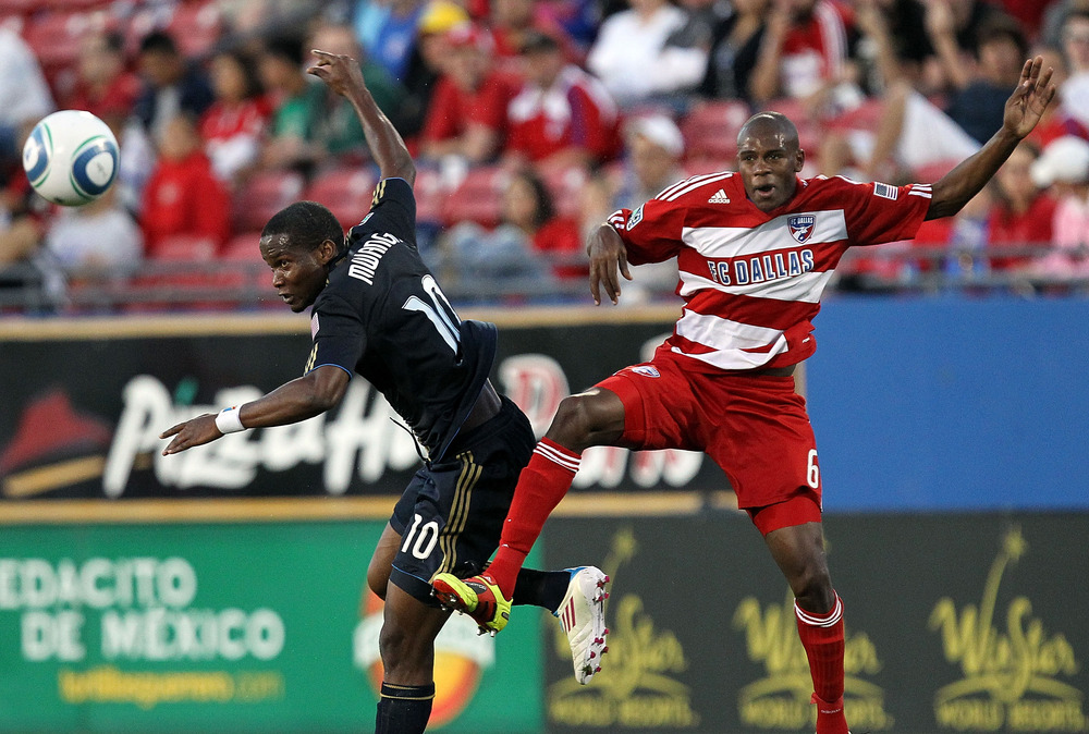 FRISCO, TX - MAY 14:  Forward Danny Mwanga #10 of the Philadelphia Union heads the ball against Jackson Goncalves #6 of FC Dallas at Pizza Hut Park on May 14, 2011 in Frisco, Texas.  (Photo by Ronald Martinez/Getty Images)
