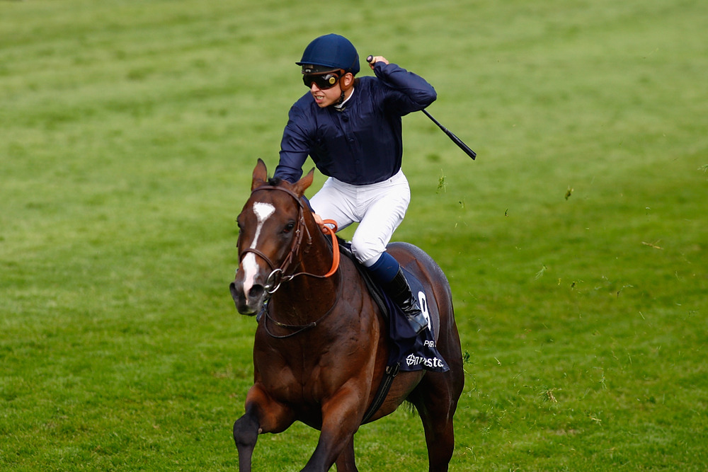 Pour Moi winning The Investec Derby at Epsom Racecourse.