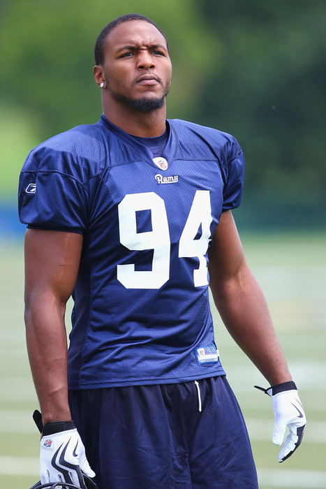 EARTH CITY, MO - JULY 31:  Robert Quinn #94 of the St. Louis Rams takes the field during training camp at the Russell Training Center on July 31, 2011 in Earth City, Missouri.  (Photo by Dilip Vishwanat/Getty Images)