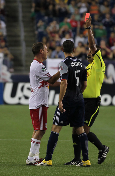 FOXBORO, MA - AUGUST 20: Teemu Tainio #2 of the New York Red Bulls is issued a red card during a game against the New England Revolution at Gillette Stadium on August 20, 2011 in Foxboro, Massachusetts. (Photo by Jim Rogash/Getty Images)