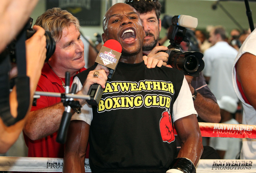 LAS VEGAS, NV - SEPTEMBER 06:  Floyd Mayweather has a few comments for a member of the media during his workout training session at his gym on September 6, 2011 in Las Vegas, Nevada.  (Photo by Jeff Bottari/Getty Images)