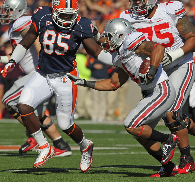 CHAMPAIGN, IL - OCTOBER 15: Dan Herron #1 of the Ohio State Buckeyes runs as Whitney Mercilus #85 of the Illiunois Fighting Illini gives chase at Memorial Stadium on October 15, 2011 in Champaign, Illinois. (Photo by Jonathan Daniel/Getty Images)