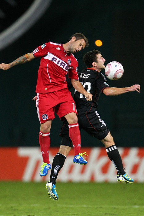 WASHINGTON, DC - OCTOBER 15: Daniel Paladini #11 of Chicago Fire attempts to head the ball against Stephen King #20 of D.C. United at RFK Stadium on October 15, 2011 in Washington, DC. (Photo by Ned Dishman/Getty Images)