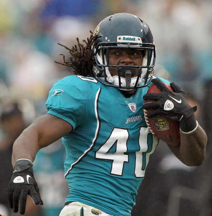 JACKSONVILLE, FL - DECEMBER 11:  DuJuan Harris #40 of the Jacksonville Jaguars runs for yardage during the game against the Tampa Bay Buccaneers at EverBank Field on December 11, 2011 in Jacksonville, Florida.  (Photo by Sam Greenwood/Getty Images)