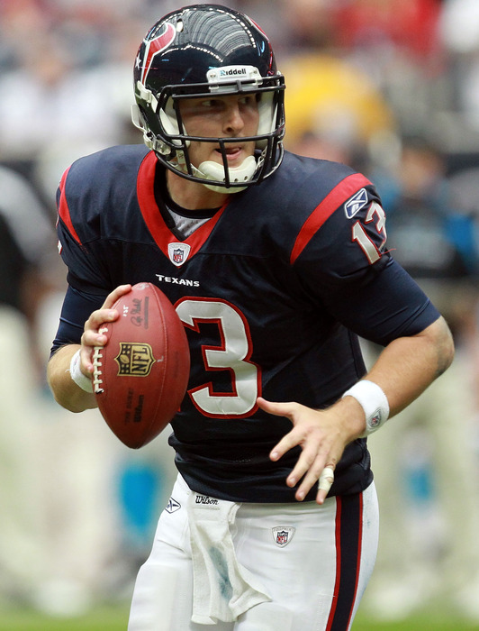 HOUSTON, TX - DECEMBER 18:   T.J. Yates #13 of the Houston Texans throws against the Carolina Panthers at Reliant Stadium on December 18, 2011 in Houston, Texas.  (Photo by Ronald Martinez/Getty Images)