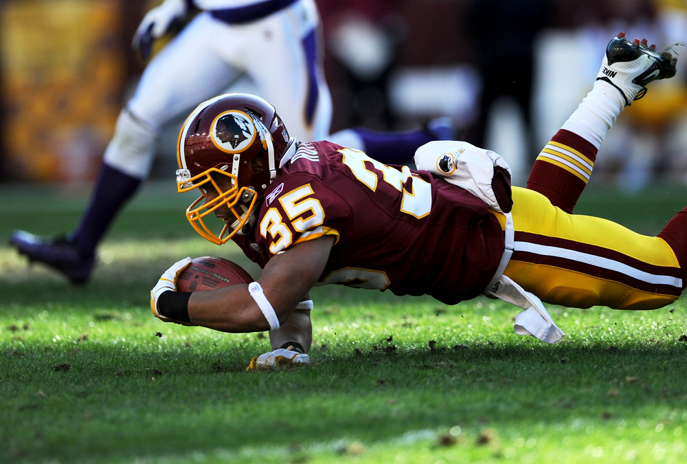 LANDOVER, MD - DECEMBER 24: Evan Royster #35 of the Washington Redskins dives for extra yards against the Minnesota Vikings in the first quarter at FedEx Field on December 24, 2011 in Landover, Maryland. (Photo by Patrick Smith/Getty Images)