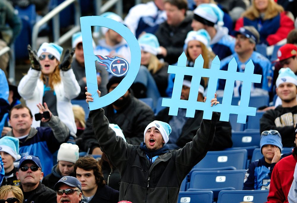 NASHVILLE, TN - DECEMBER 24:  A Tennessee Titans fan cheers during a game against the Jacksonville Jaguars at LP Field on December 24, 2011 in Nashville, Tennessee. The Titans won 23-17.  (Photo by Grant Halverson/Getty Images)