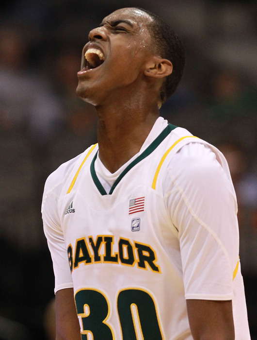DALLAS, TX - DECEMBER 28:  Quincy Miller #30 of the Baylor Bears reacts during play against the Mississippi State Bulldogs at American Airlines Center on December 28, 2011 in Dallas, Texas.  (Photo by Ronald Martinez/Getty Images)