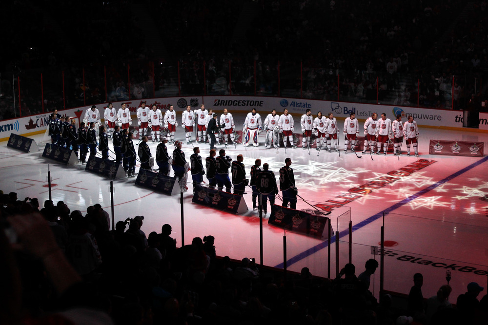 OTTAWA, ON - JANUARY 29:  Team Chara and team alfredsson line up for the performance of the anthem poses prior to the 2012 NHL All-Star Game at Scotiabank Place on January 29, 2012 in Ottawa, Ontario, Canada.  (Photo by Gregory Shamus/Getty Images)
