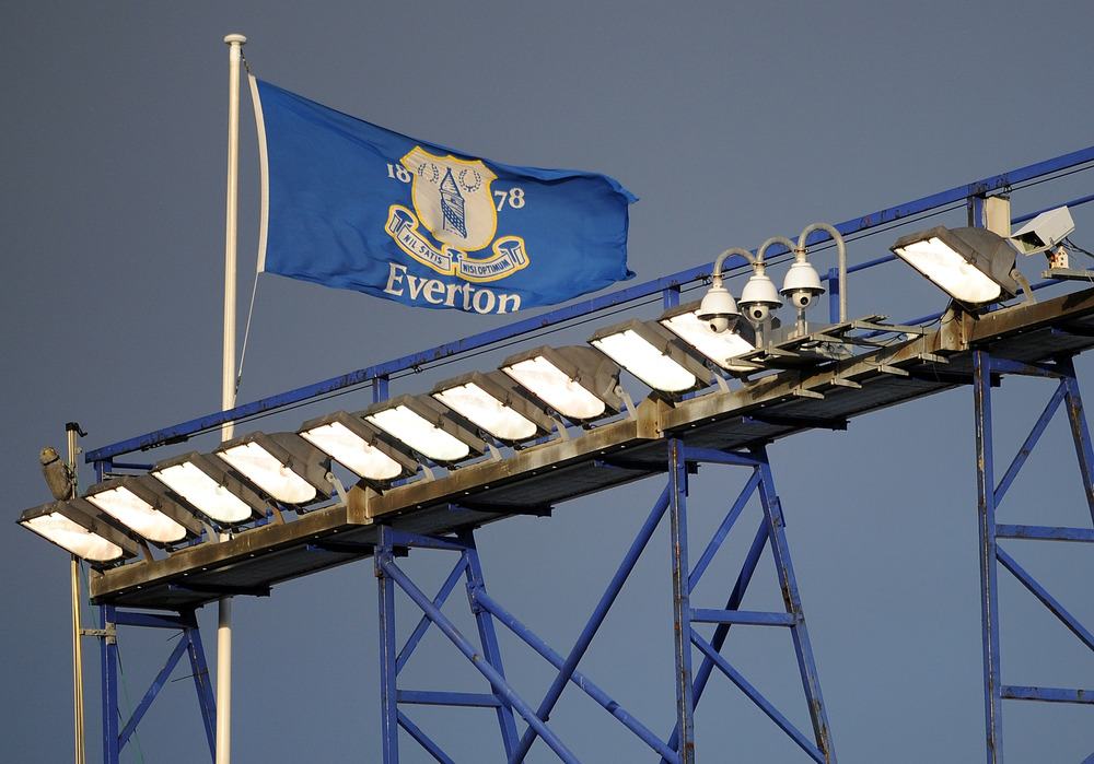 LIVERPOOL, ENGLAND - FEBRUARY 18:  An Everton flag flies above the stadium during the FA Cup Fifth Round match between Everton and Blackpool at Goodison Park on February 18, 2012 in Liverpool, England.  (Photo by Chris Brunskill/Getty Images)