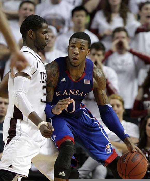 February 22, 2012; College Station, TX, USA; Kansas Jayhawks forward Thomas Robinson (0) attempts to drive the ball in the second half against the Texas A&M Aggies at Reed Arena. Mandatory Credit: Troy Taormina-US PRESSWIRE