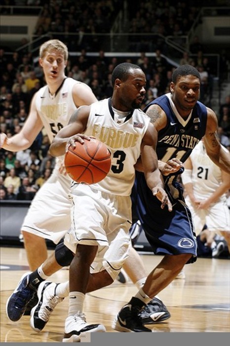 Feb 29, 2012; West Lafayette, IN, USA; Purdue Boilermakers guard Lewis Jackson (23) drives to the basket against  Penn State Nittany Lions guard Jermaine Marshall (11) at Mackey Arena.  Mandatory Credit: Brian Spurlock-US PRESSWIRE