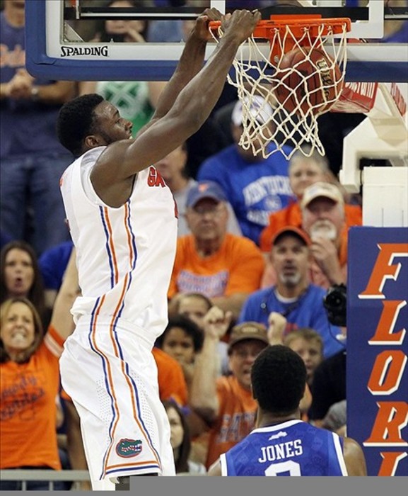 March 4, 2012; Gainesville, FL, USA; Florida Gators forward/center Patric Young (4) dunks during the second half against the Kentucky Wildcats at the Stephen C. O'Connell Center. Kentucky won 74-59. Mandatory Credit: Kim Klement-US PRESSWIRE