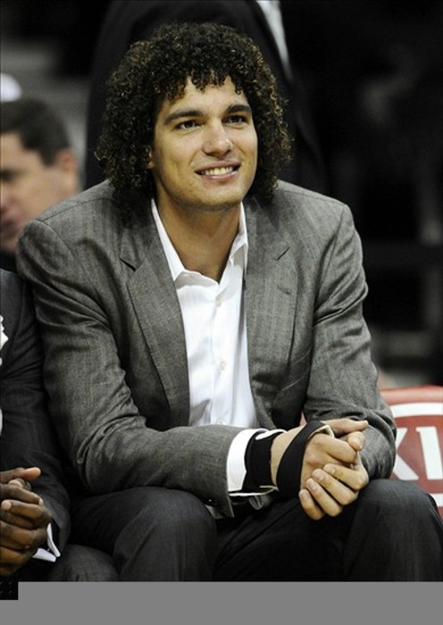 Mar 5, 2012; Cleveland, OH, USA; Injured player Cleveland Cavaliers power forward Anderson Varejao (17) sits on the bench in the second quarter against the Utah Jazz at Quicken Loans Arena. Mandatory Credit: David Richard-US PRESSWIRE