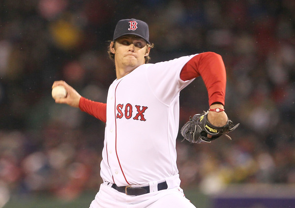 BOSTON - APRIL 17:  Clay Buchholz #11 of the Boston Red Sox throws against the Tampa Bay Rays at Fenway Park on April 17, 2010 in Boston, Massachusetts. (Photo by Jim Rogash/Getty Images)
