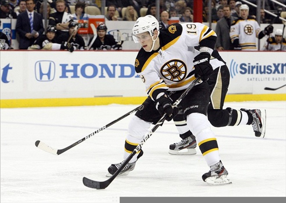 March 11, 2012; Pittsburgh,PA, USA: Boston Bruins center Tyler Seguin (19) brings the puck up ice against the Pittsburgh Penguins during the third period at the CONSOL Energy Center. The Pens won 5-2. Mandatory Credit: Charles LeClaire-USPRESSWIRE