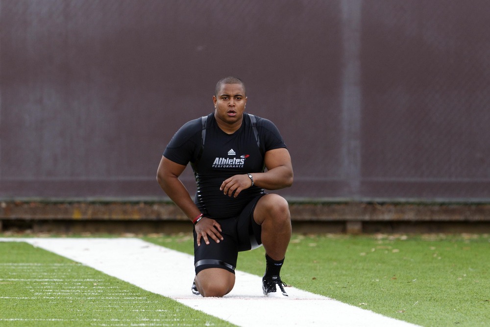 Stanford's Jonathan Martin is stunned to hear his name called so early. Mandatory Credit: Jason O. Watson-US PRESSWIRE