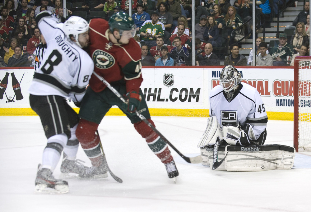 MAR 31, 2012; St. Paul, MN, USA;   Los Angeles Kings goalie Jonathan Bernier (45) makes a save in the second period against the Minnesota Wild at Xcel Energy Center.    Mandatory Credit: Marilyn Indahl-US PRESSWIRE