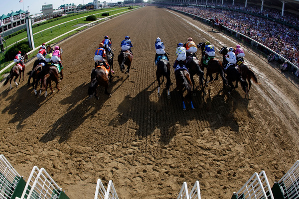 LOUISVILLE, KY - APRIL 30:  The field leaves the gate at the start of the 136th running of the Kentucky Oaks at Churchill Downs on April 30, 2010 in Louisville, Kentucky.  (Photo by Andy Lyons/Getty Images)