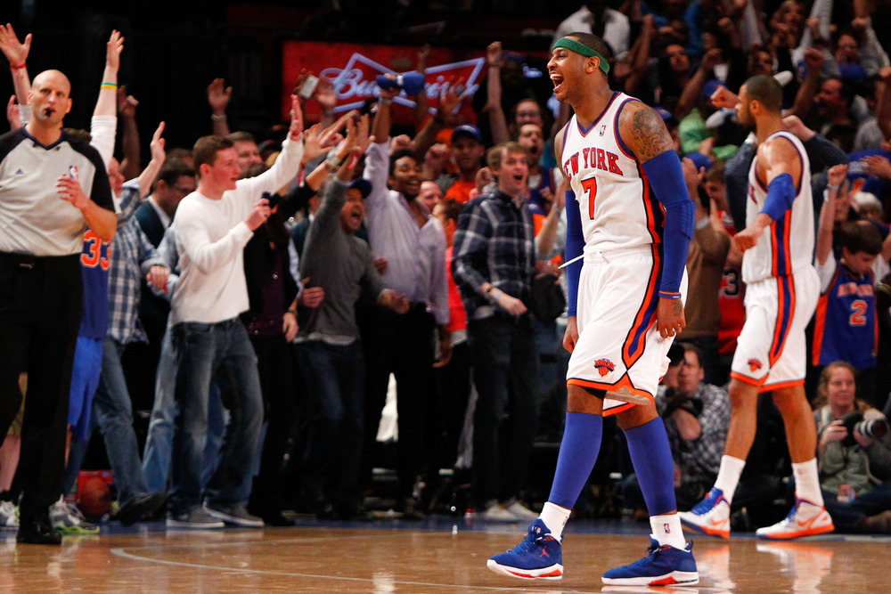 Apr. 8, 2012; New York, NY, USA; New York Knicks small forward Carmelo Anthony (7) reacts after winning the game in overtime against the Chicago Bulls at Madison Square Garden. Knicks won in overtime 100-99. Mandatory Credit: Debby Wong-US PRESSWIRE
