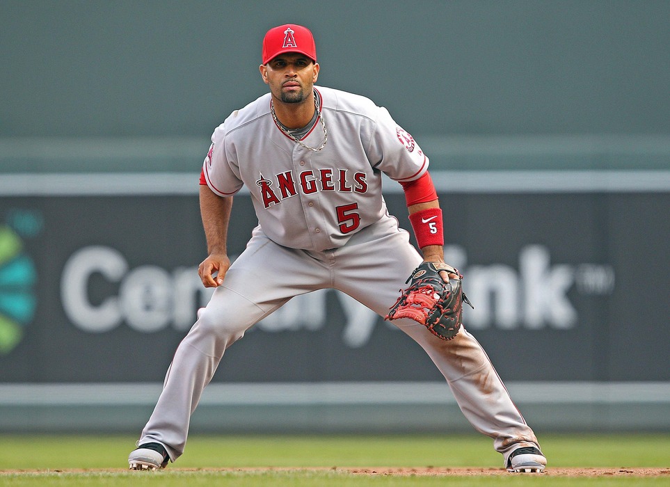 Apr 9, 2012; Minneapolis, MN, USA: Los Angeles Angels first baseman Albert Pujols (5) gets ready to field a ball in the fifth inning against the Minnesota Twins at Target Field. Mandatory Credit: Jesse Johnson-US PRESSWIRE
