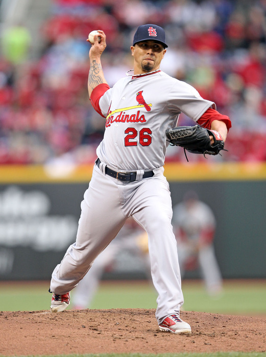 CINCINNATI, OH - APRIL 10:  Kyle Lohse #26 of the St Louis Cardinals throws a pitch during the game against the Cincinnati Reds at Great American Ball Park on April 10, 2012 in Cincinnati, Ohio.  (Photo by Andy Lyons/Getty Images)