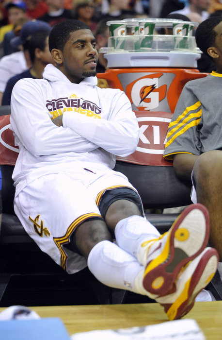 Apr 25, 2012; Cleveland, OH, USA;  Cleveland Cavaliers point guard Kyrie Irving (2) sits on the bench in the second quarter against the Washington Wizards at Quicken Loans Arena. Mandatory Credit: David Richard-US PRESSWIRE