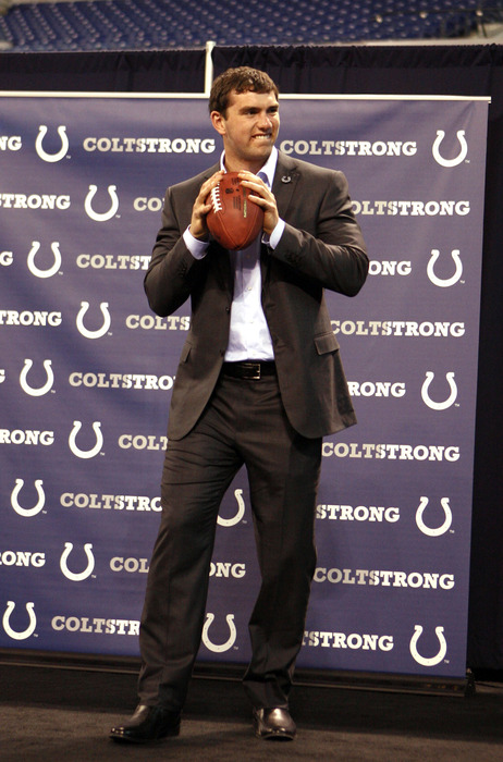 Apr 27, 2012; Indianapolis, IN, USA; Indianapolis Colts quarterback Andrew Luck throws a pass on stage at a NFL Draft Party at Lucas Oil Stadium. Mandatory Credit: Brian Spurlock-US PRESSWIRE